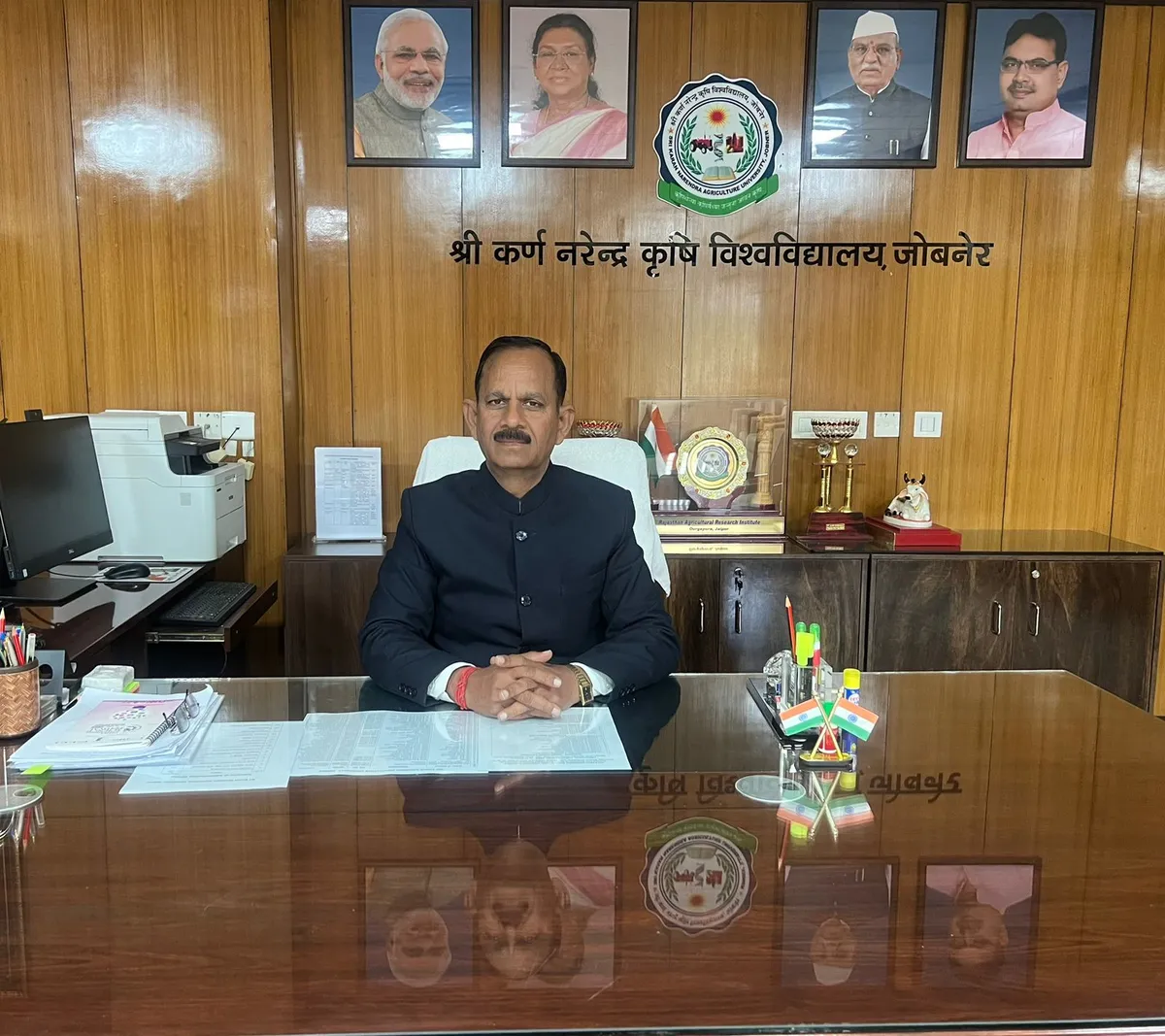 Prof. (Dr.) Pushpendra Singh Chauhan in the Vice Chancellor's office